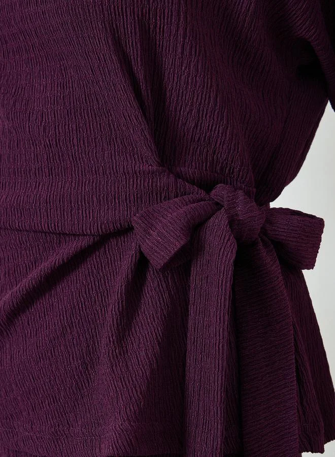 ستايلي طقم من بلوزة بارزة الملمس وبنطال بأرجل واسعة